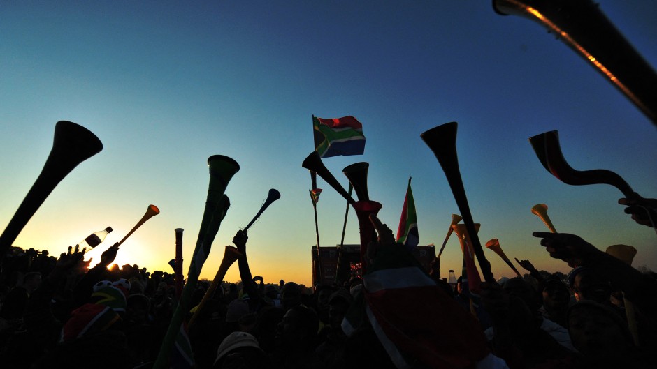 South African fans celebrate in Johannesburg.