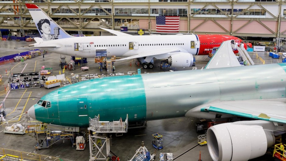 A Boeing 777 (front) and a 787-9 Dreamliner are under production at the Boeing Everett Production Facility in Everett, Washington. AFP/Jennifer Buchanan