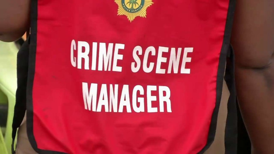 File: A police officer at a crime scene. eNCA