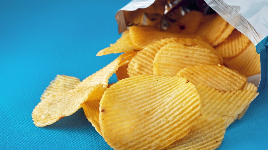 File: Potato chips in a bag. GettyImages/cagkansayin