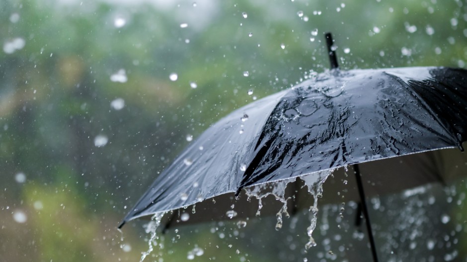 File: A person holding an umbrella in the rain. GettyImages/sarayut Thaneerat