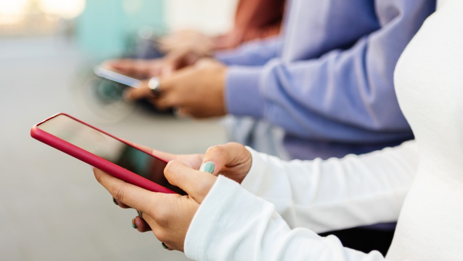 File: Teenagers using cellphones. GettyImages/Xavier Lorenzo