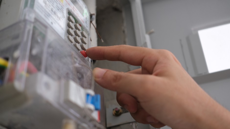 File: A person entering a pin for prepaid electricity. GettyImages/wisely