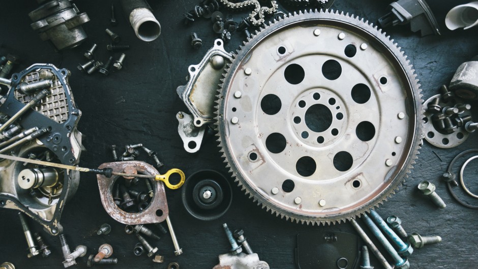 File: Car parts displayed on a workbench. GettyImages/urbancow