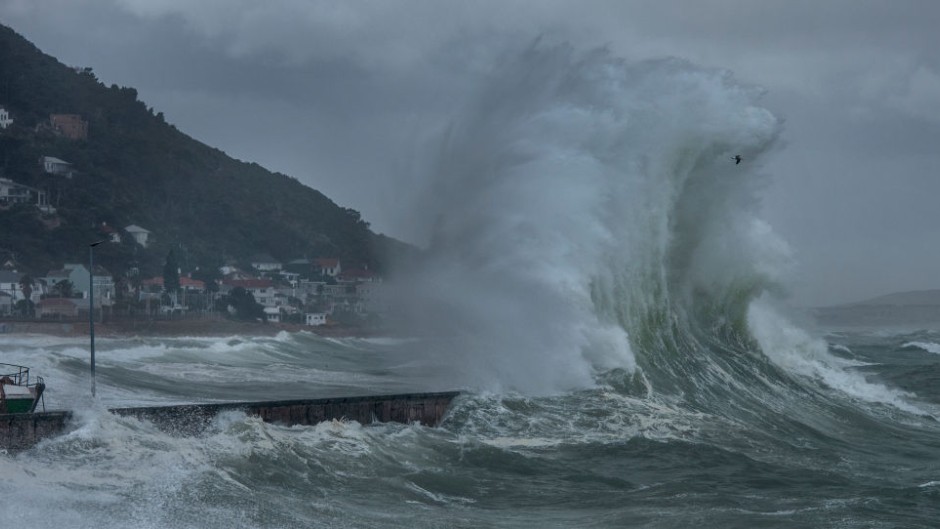 File: Large waves and strong winds batter Kalk Bay harbour. Brenton Geach/Gallo Images via Getty Images