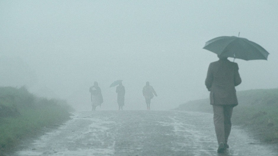 File: People walking in the rain. David Turnley/Corbis/VCG via Getty Images