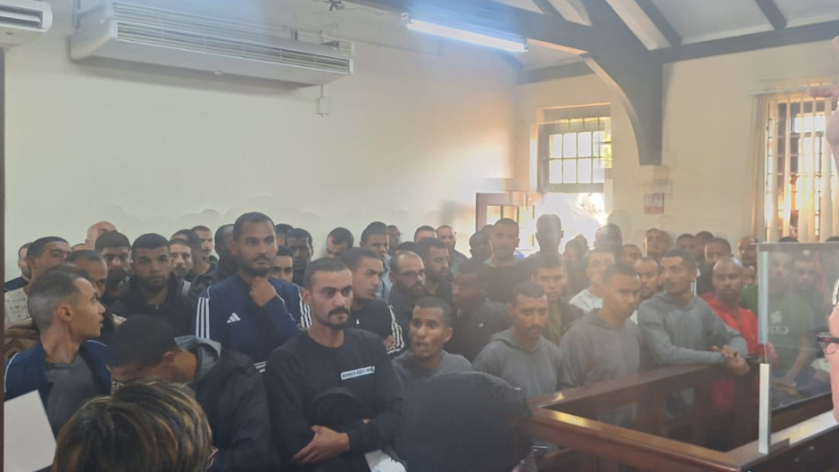 95 arrested Libyan nationals appear in court. 