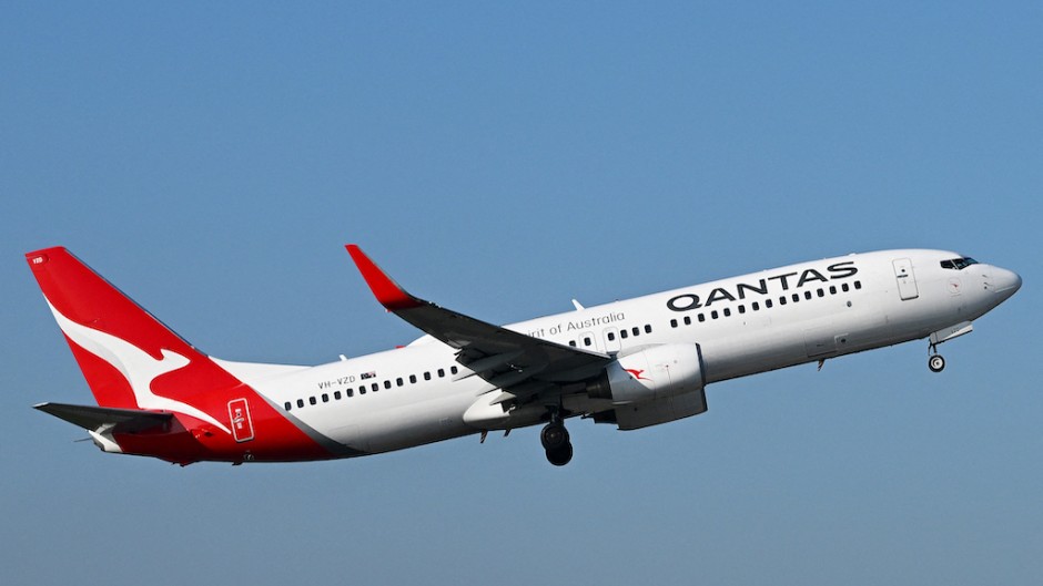 File: A Qantas plane is departing Melbourne Airport. Morgan Hancock/NurPhoto via AFP