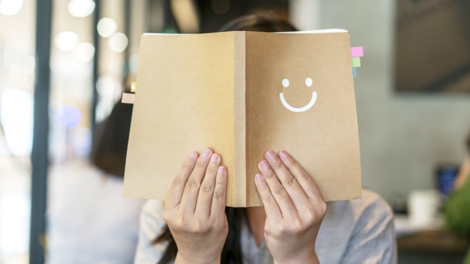 File: A person reading a book. GettyImages/yipengge