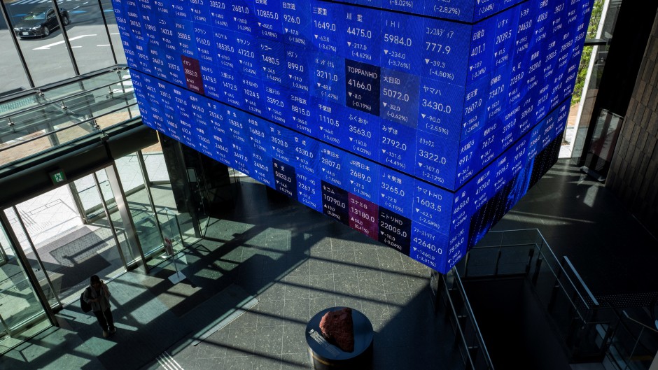 An electronic quotation board displays stock prices of Nikkei 225 on the Tokyo Stock Exchange in Tokyo. AFP/Kazuhiro Nogi