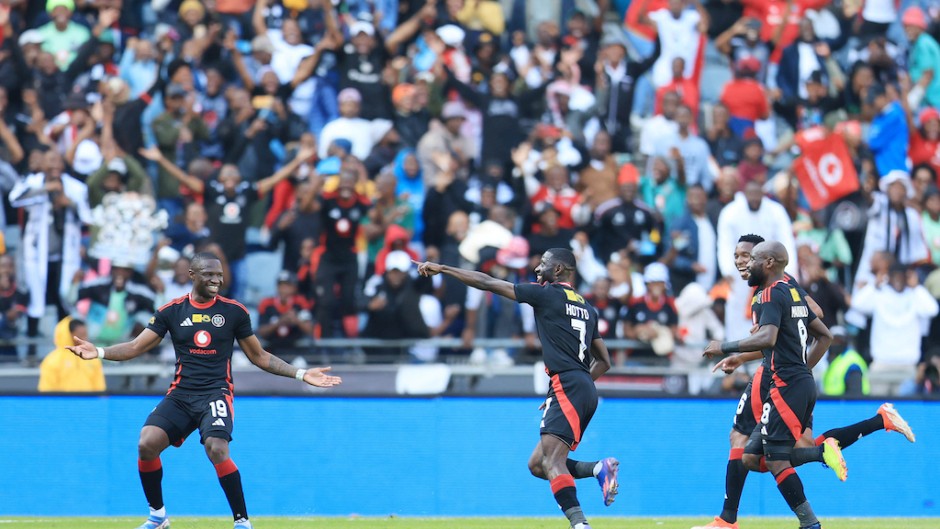 Deon Hotto of Orlando Pirates celebrates a goal with his teammates. BackpagePix/Samuel Shivambu