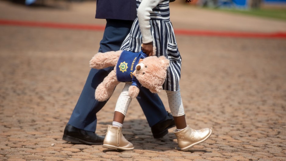 File: A little girl seen at the annual SAPS Commemoration Day at the SAPS Memorial Site at the Union Buildings. Alet Pretorius/Gallo Images via Getty Images