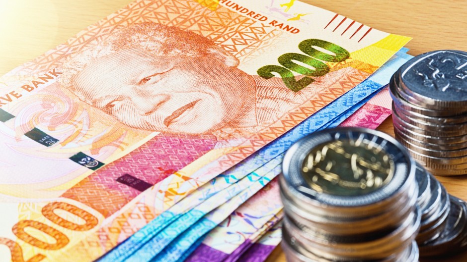 File: South African rands and rand coins. GettyImages/RapidEye