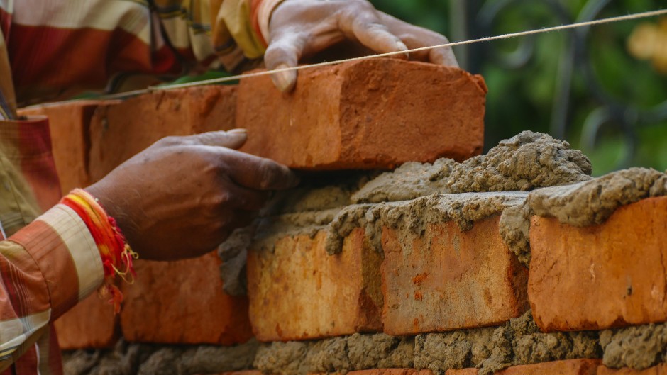 File: A construction worker on a building site. GettyImages/anand purohit