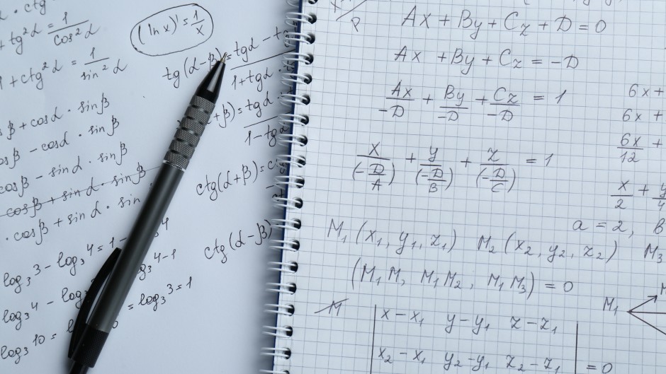 File: Paper with different mathematical formulas. GettyImages/Liudmila Chernetska