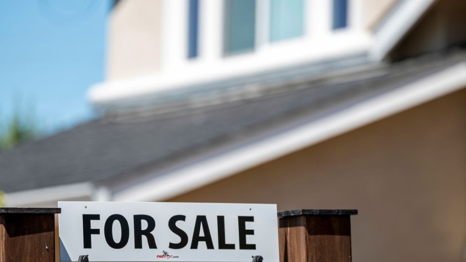 File: A "For Sale" sign in front of a home. David Paul Morris/Bloomberg via Getty Images