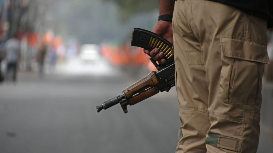 File: An Indian policeman stands alert. Faisal Khan/NurPhoto via Getty Images