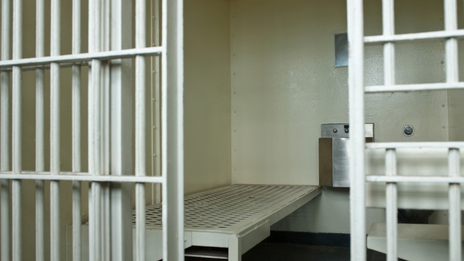 File: An open door to a prison cell. GettyImages/WIN-Initiative/Neleman