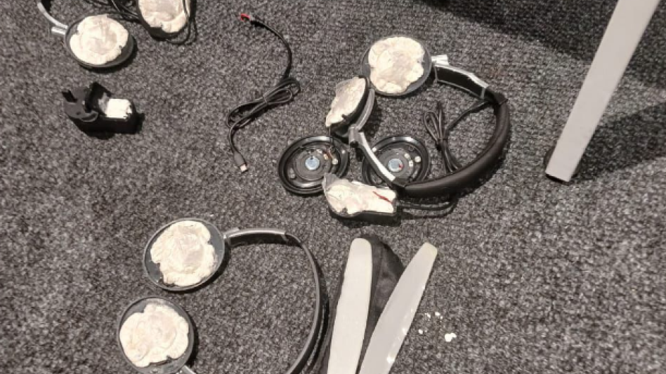 Cocaine stashed inside aircraft headphones. Supplied