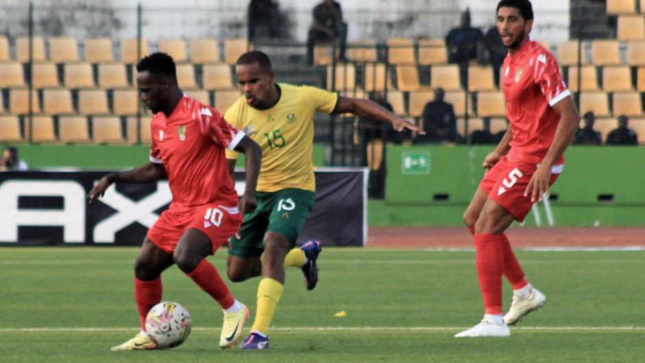 Congo players and Bafana's Iqraam Rayners. BackpagePix/Louvila Fonseca Brice Rogatien