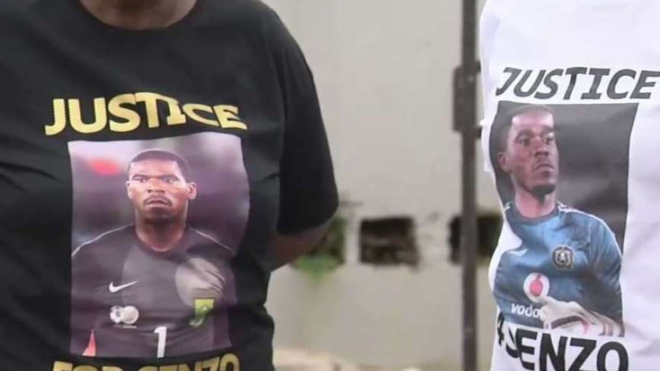 Family members with shirts calling for justice for Senzo Meyiwa.