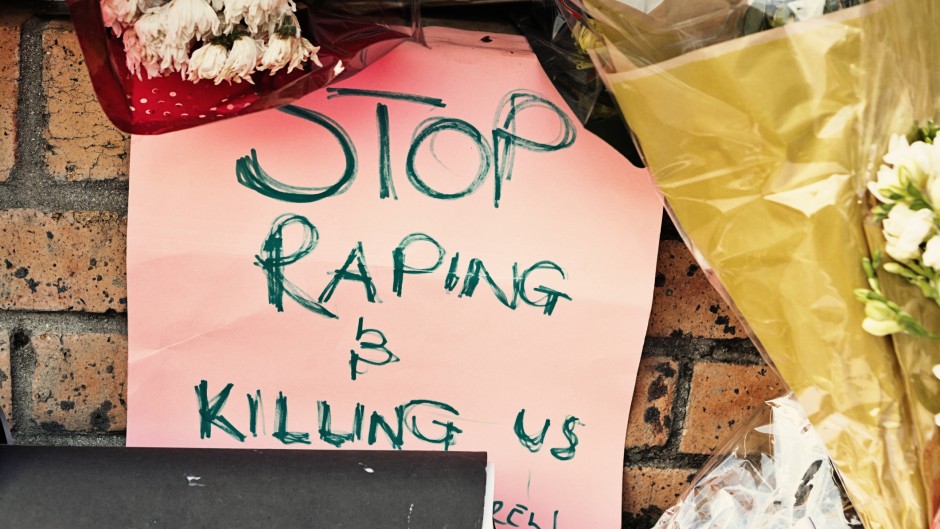 File: A sign left as a protest against gender violence at the scene of a rape and murder. GettyImages/RapidEye