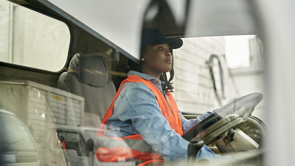 File: A female truck driver. GettyImages/xavierarnau