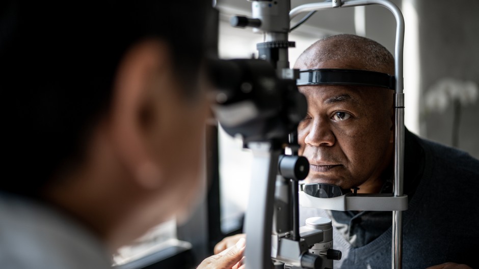 File: An ophthalmologist examining a patient's eyes. GettyImages/FG Trade