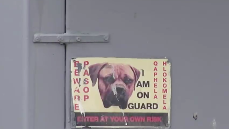 Beware of the dog sign