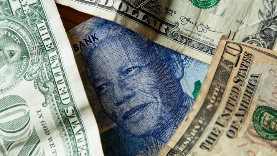 A rand to the dollar currency exchange concept image. GettyImages/Matthew de Lange