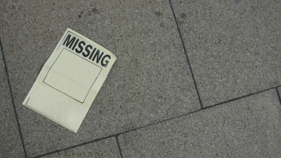 File: A poster for a missing person. GettyImages/ijoe84