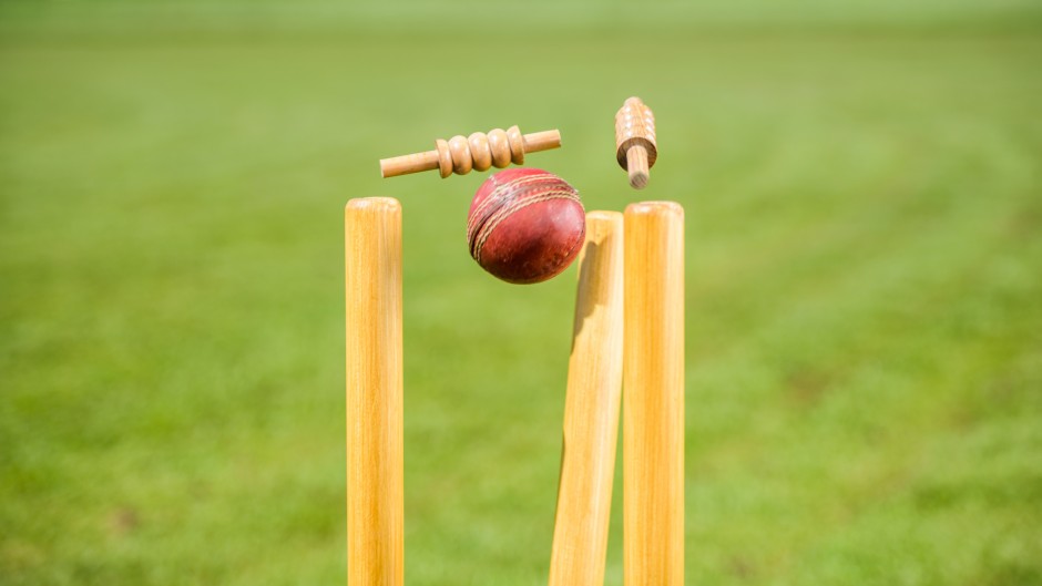 File: Close-up of cricket ball hitting the stumps. GettyImages/simonkr