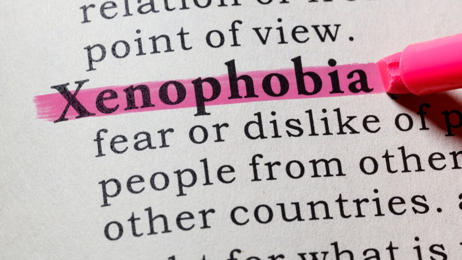 File: The word xenophobia, including key descriptive words. GettyImages/Devonyu