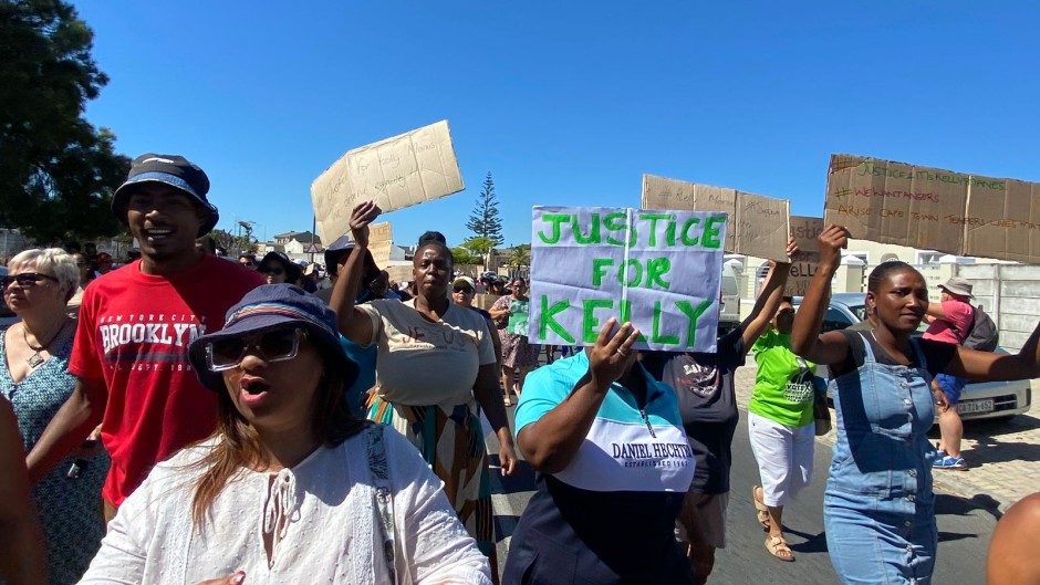 Community marches in support of former Belhar teacher / eNCA