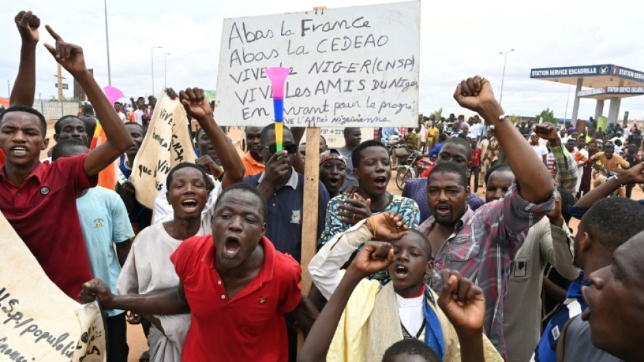 Some shouted their support for the country's new strongman, General Abdourahamane Tiani