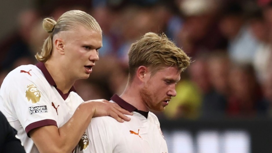 Kevin De Bruyne (right) suffered another hamstring injury in Man City's 3-0 win at Burnley