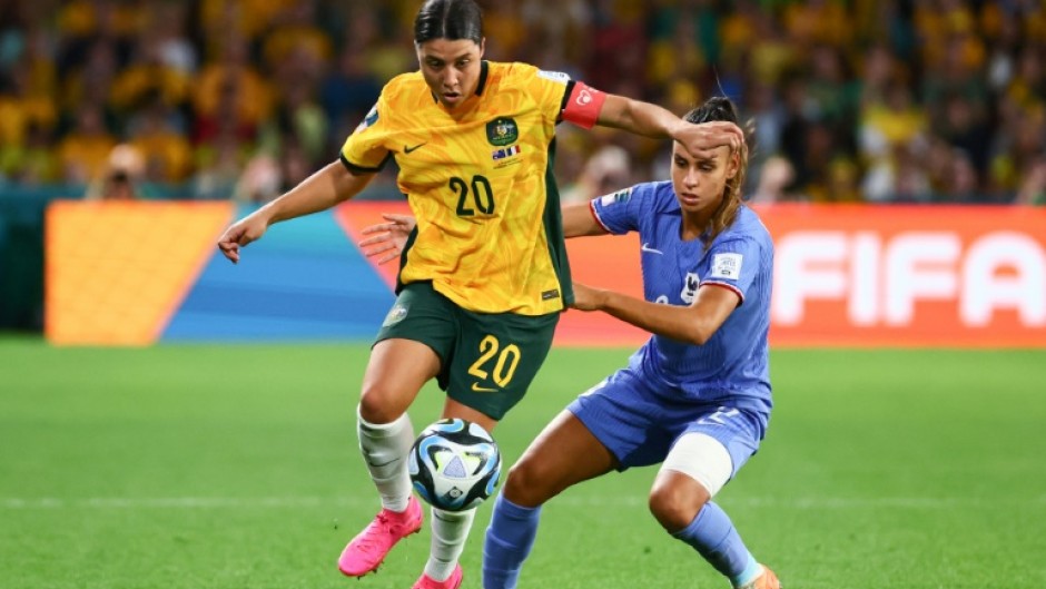 Sam Kerr holds off French defender Maelle Lakrar after coming on as a second-half substitute