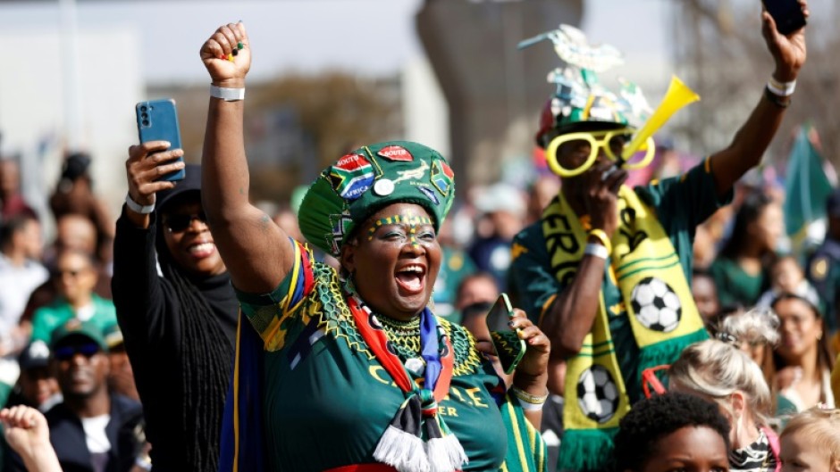 A Springboks supporter bids farewell to the Rugby World Cup squad at a Johannesburg airport before they left for London on August 12, 2023.  