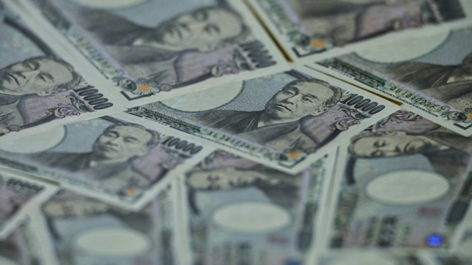 Bets on another US interest rate hike have pushed the dollar up against the yen