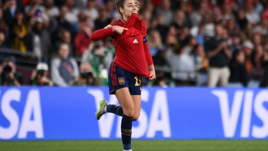 Olga Carmona celebrates scoring for Spain