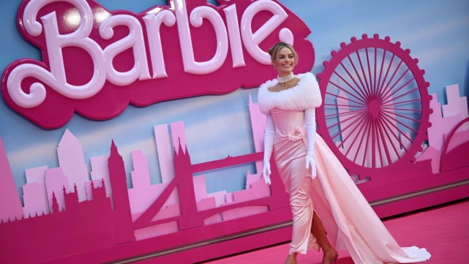 Australian actress Margot Robbie poses for a photo during the premier of "Barbie" in London