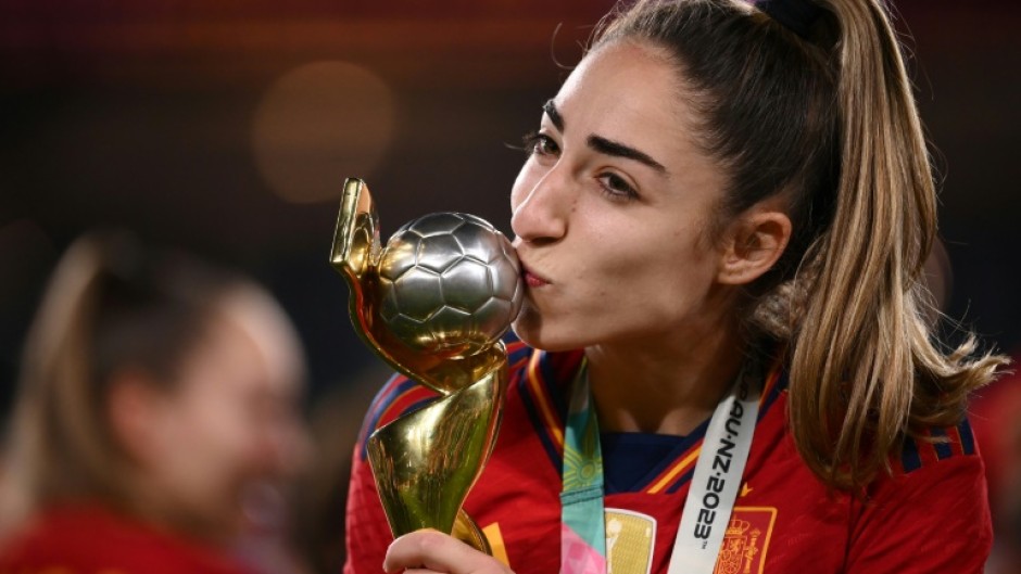 Spain captain and goalscorer Olga Carmona kisses the World Cup