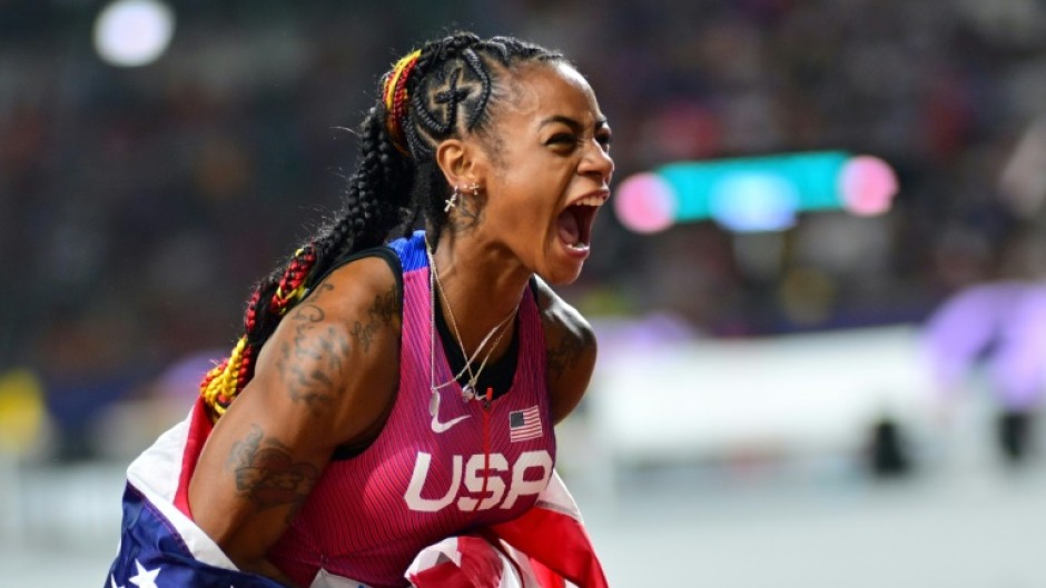 USA's Sha'Carri Richardson screams in joy after winning the women's world 100m gold