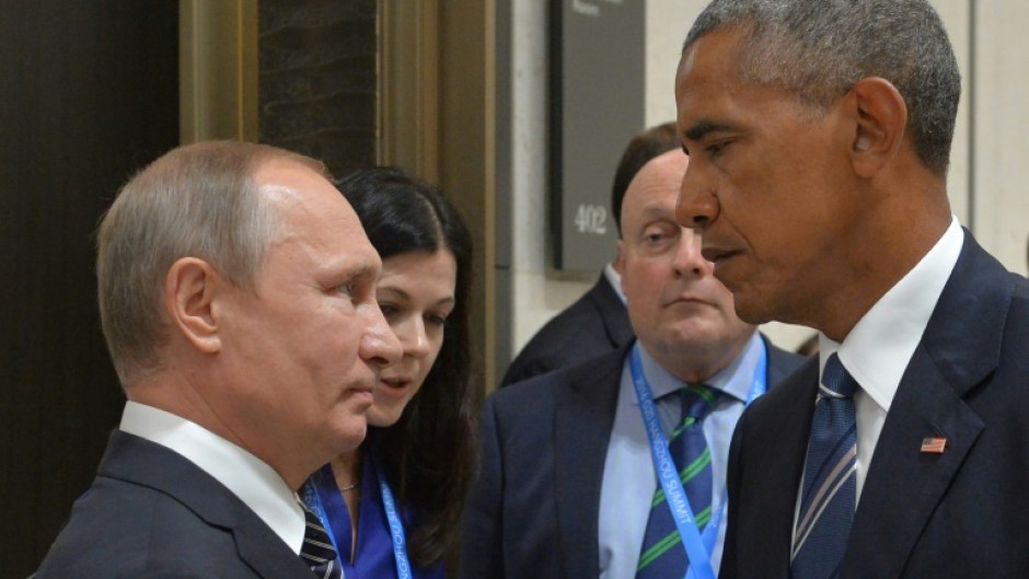 Then US president Barack Obama gazes at Russian President Vladimir Putin at the G20 Leaders Summit in Hangzhou, China on September 5, 2016.