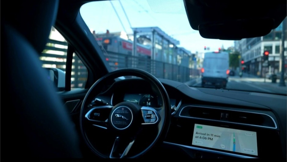 So far full self-driving cars are limited to certain areas, like this Waymo car in San Francisco