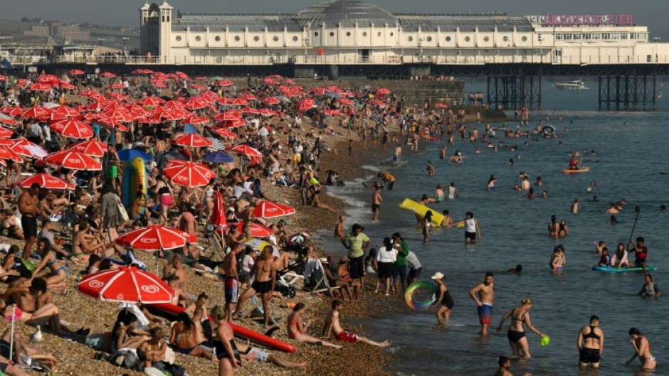 High September temperatures have seen Britons flock to beaches such as Brighton in southern England