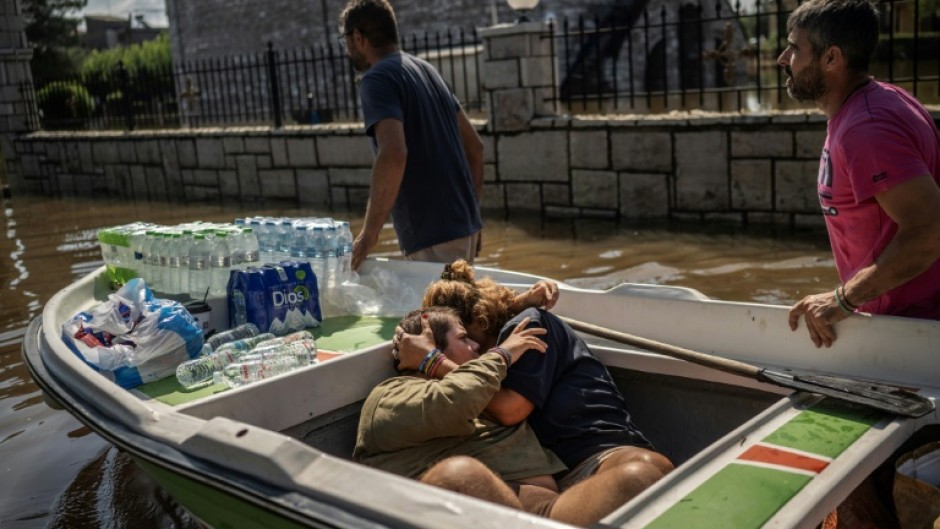 Volunteers rescue local people in the central Greece village of Palamas