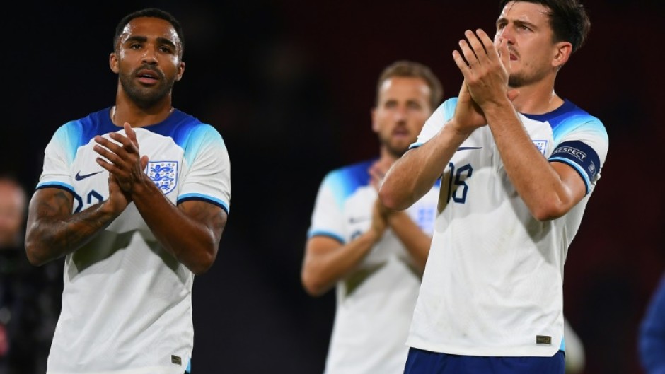 Harry Maguire (right) applauds the fans after England's 3-1 win against Scotland in Glasgow