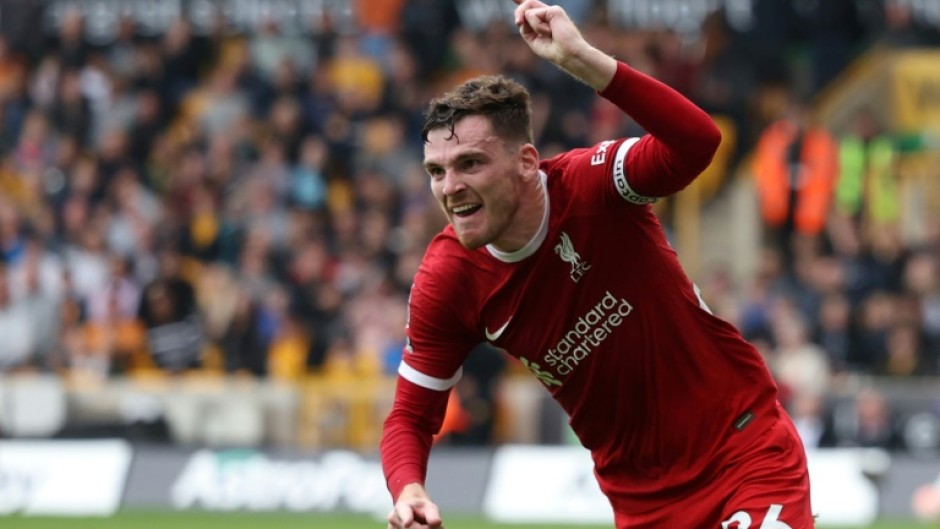 Liverpool's Andy Robertson celebrates his goal against Wolves