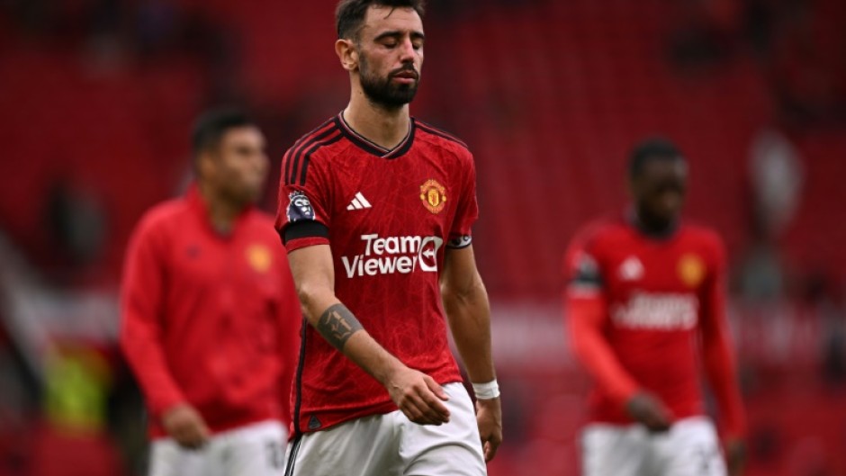 A dejected Bruno Fernandes leaves the pitch at Old Trafford after the 3-1 defeat by Brighton